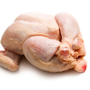 raw roasting chicken isolated on a white background